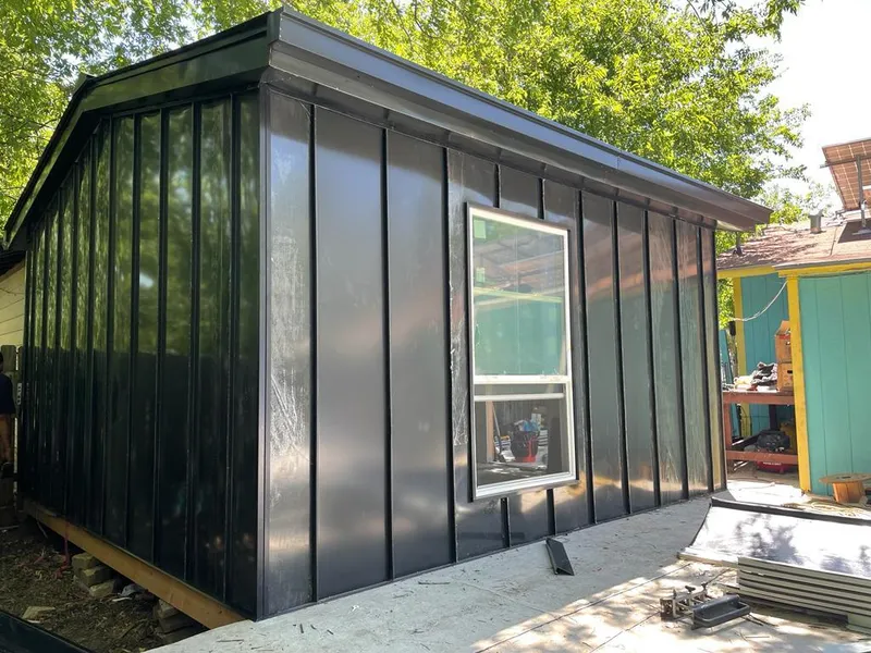 Black standing seam metal wall panels for Roof Inspection in Bismarck