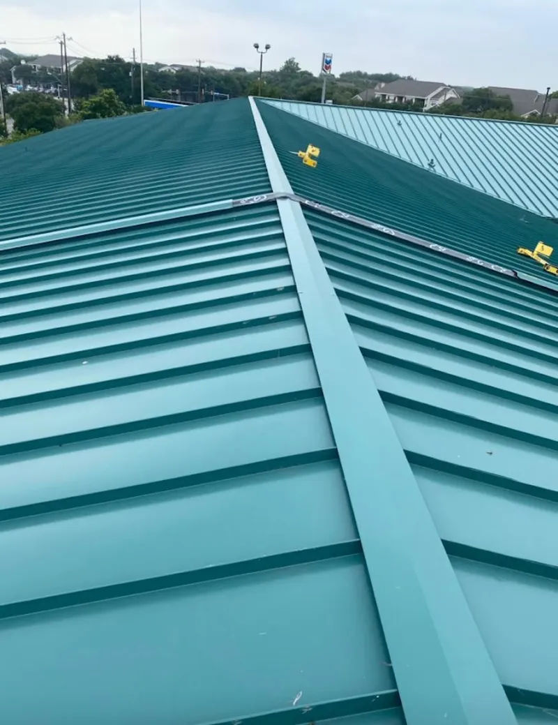 Green commercial metal roof ridge and valley for Metal Roof Repair in Bismarck