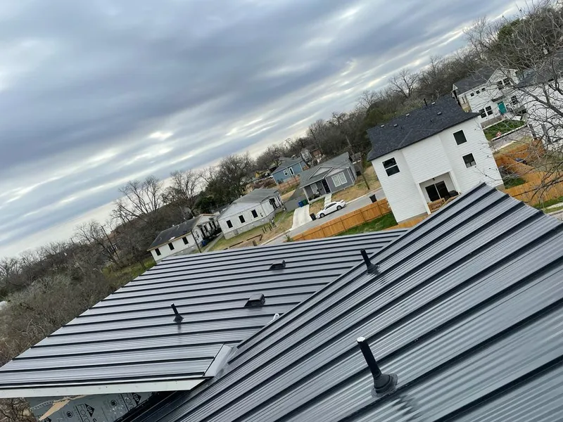 Standing seam metal roof panels with vents for Skylight Repair in Bismarck